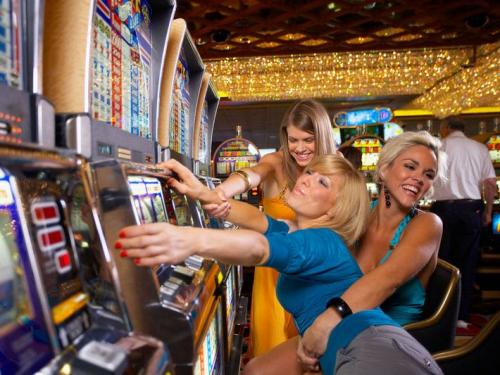 Woman-Enjoys-Playing-Slots.jpg